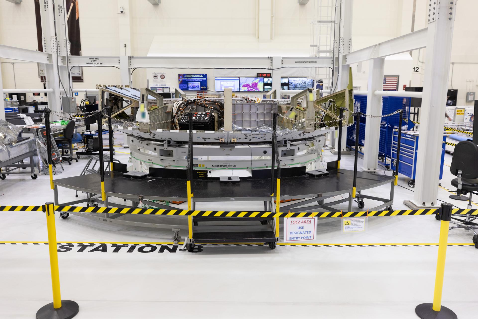 Orion crew module adapter wiring installation at Kennedy